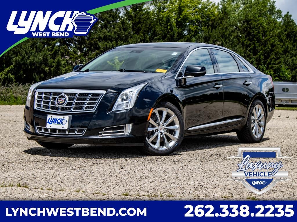 2014 Cadillac XTS Premium in Black Raven — front three-quarter view