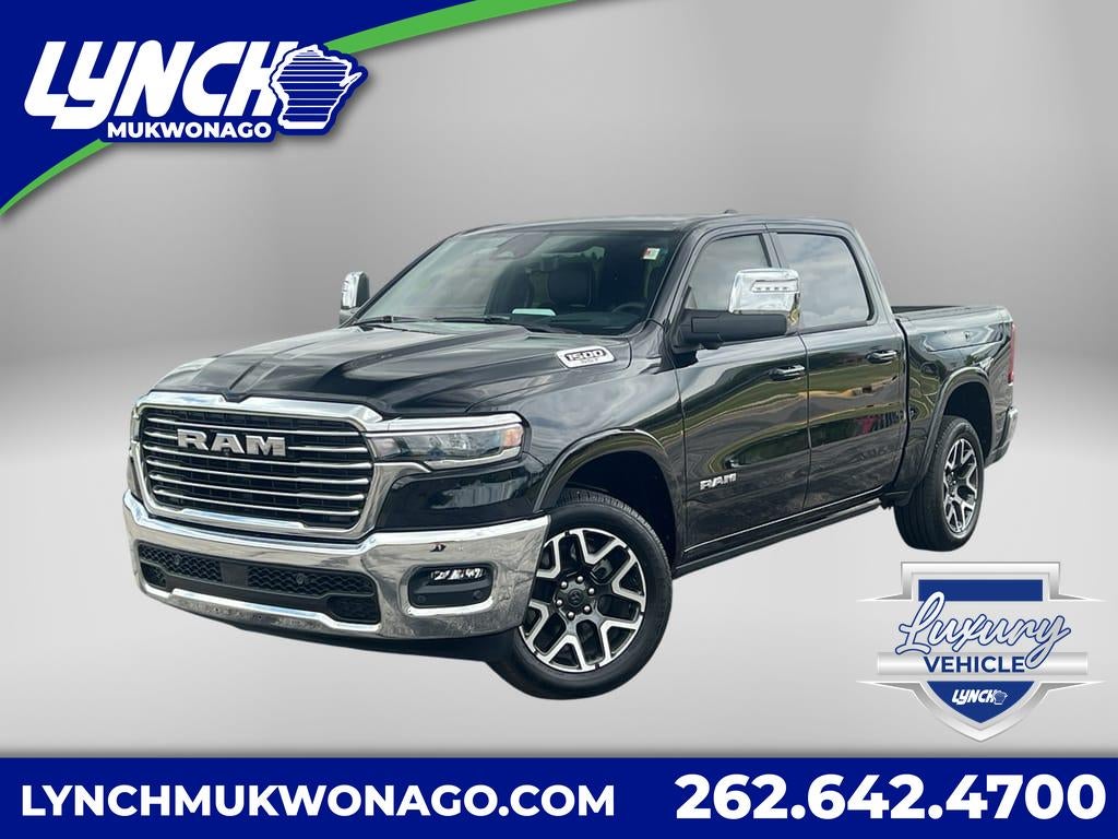 2025 RAM 1500 Laramie in Diamond Black Crystal Pearlcoat — front three-quarter view