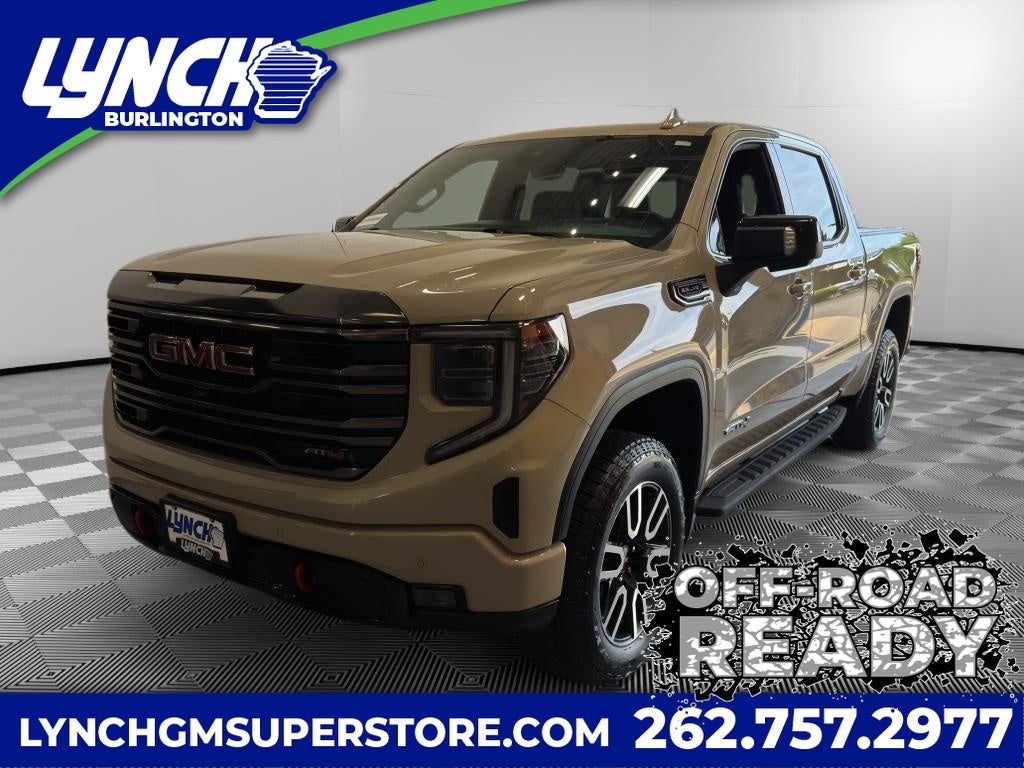 2022 GMC Sierra 1500 AT4 in Desert Sand Metallic — front three-quarter view