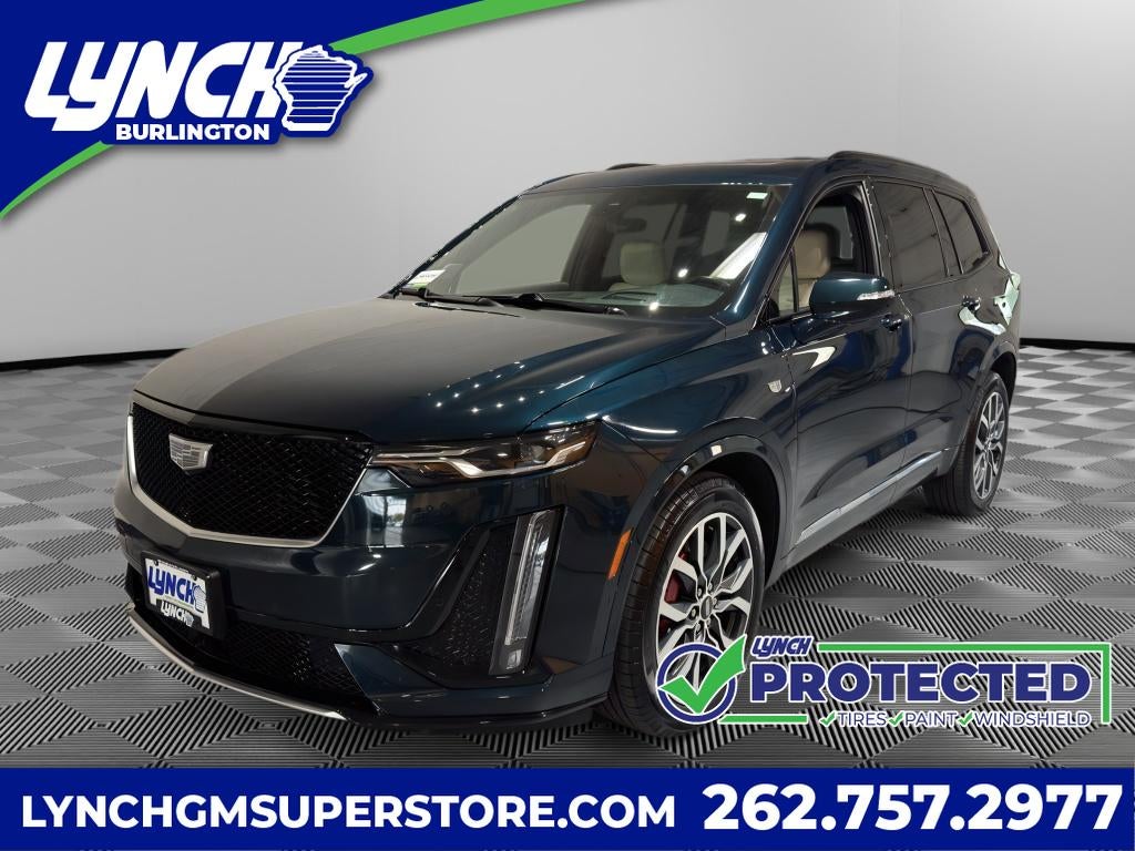 2024 Cadillac XT6 Sport in Emerald Lake Metallic — front three-quarter view